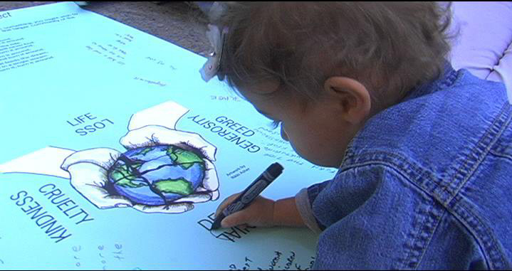 Child drawing on 9/11 poster